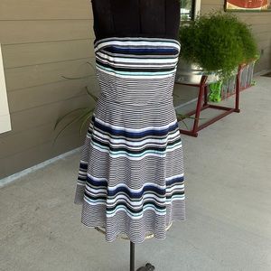 Beautiful strapless flowing side zip dress